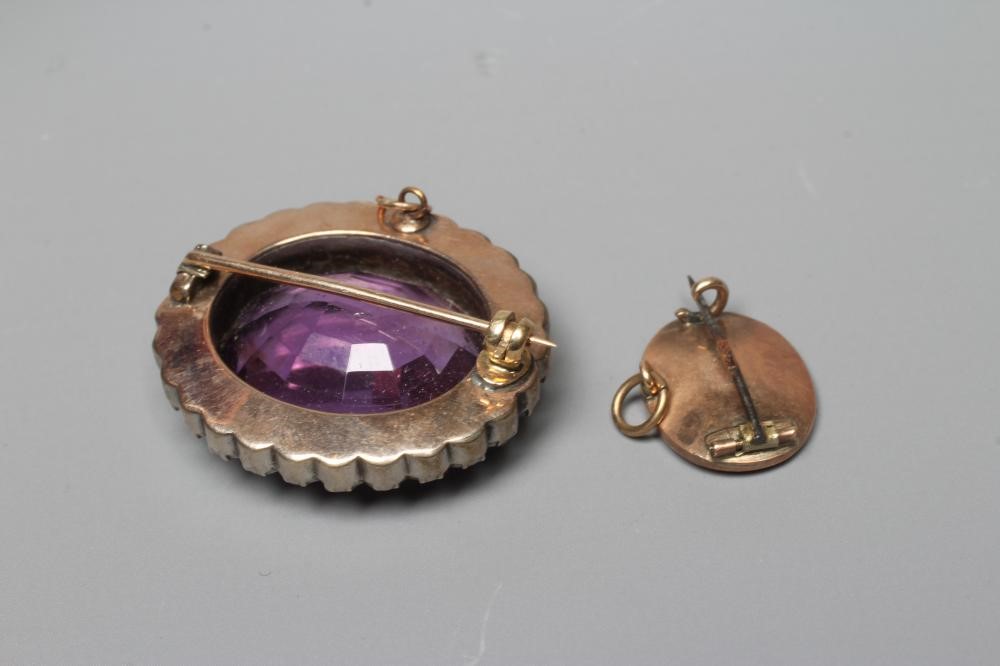 A VICTORIAN MICRO-MOSAIC OVAL MINIATURE BROOCH centred by a butterfly on a black ground Image