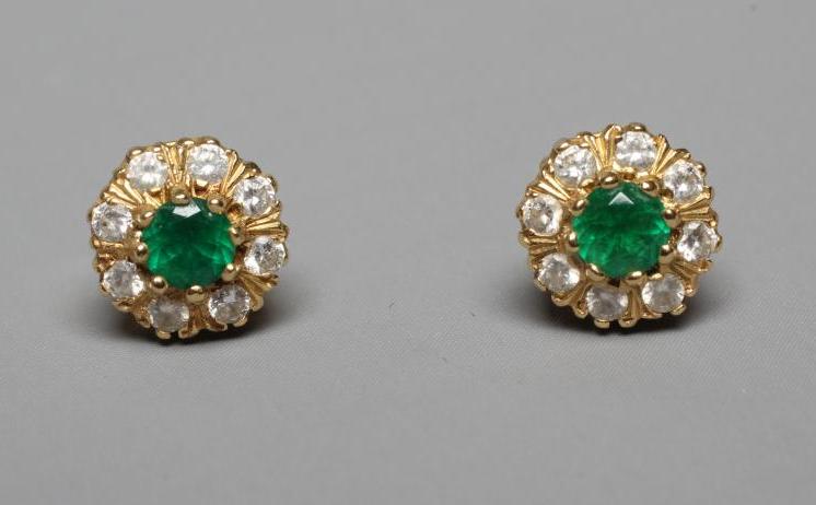 A PAIR OF EMERALD AND DIAMOND CLUSTER EAR STUDS Image