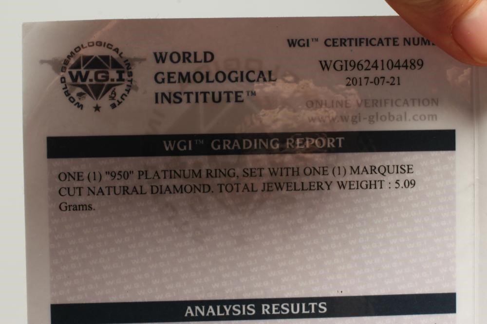 A SOLITAIRE DIAMOND RING Image