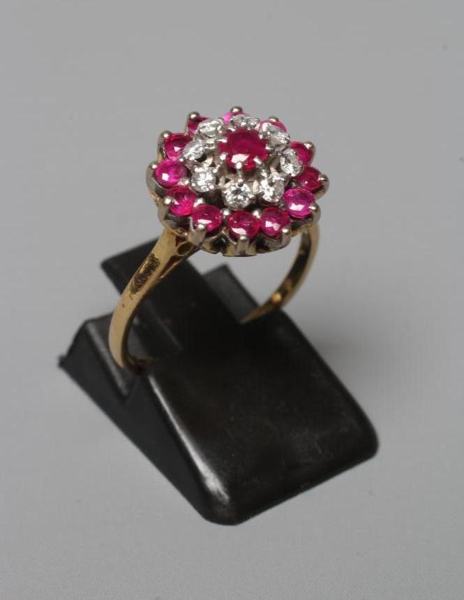 A RUBY AND DIAMOND CLUSTER RING Image