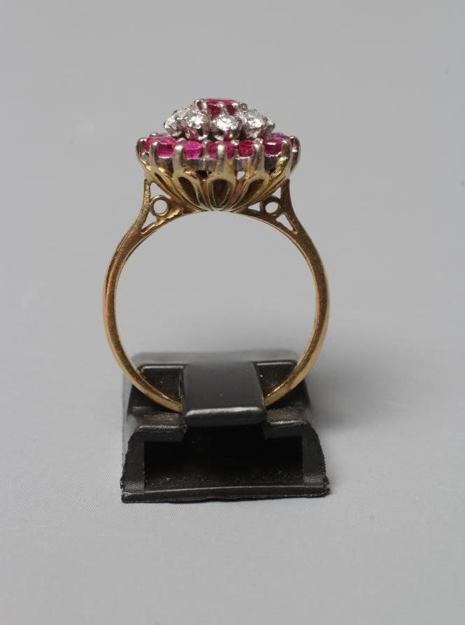 A RUBY AND DIAMOND CLUSTER RING Image