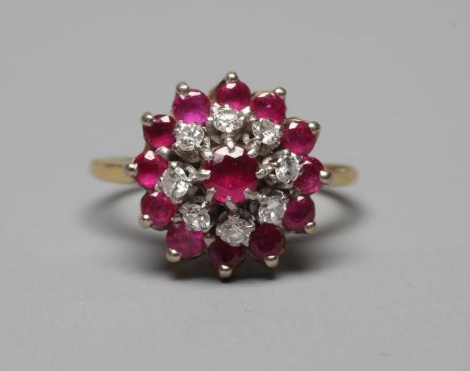 A RUBY AND DIAMOND CLUSTER RING Image