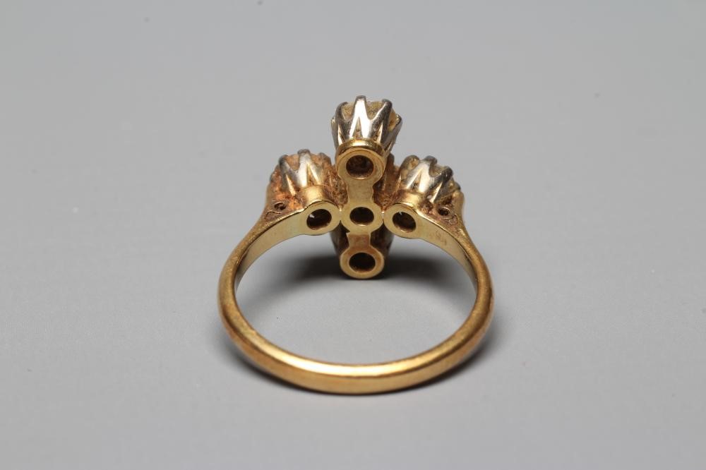 A FIVE STONE DIAMOND RING, the old brilliant cut stones each of approximately 0.25cts, claw set to a Image