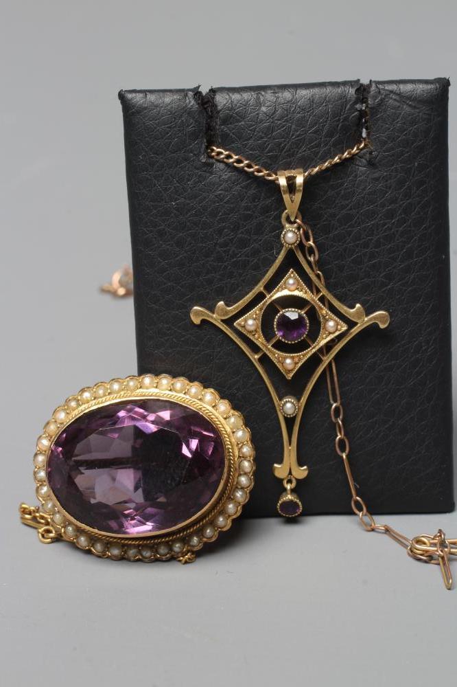 AN EDWARDIAN AMETHYST AND SEED PEARL PENDANT Image