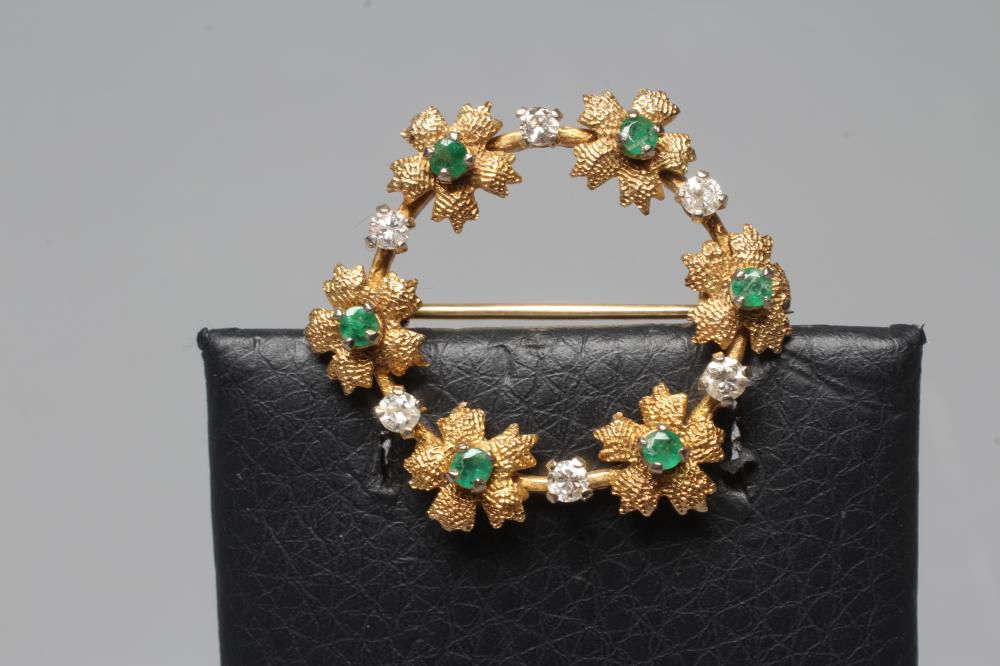 AN EMERALD AND DIAMOND WREATH BROOCH Image