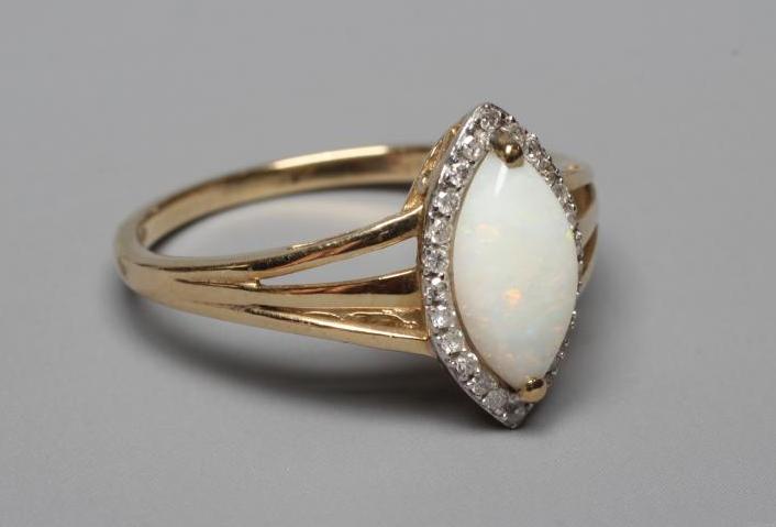 AN OPAL AND DIAMOND CLUSTER RING Image