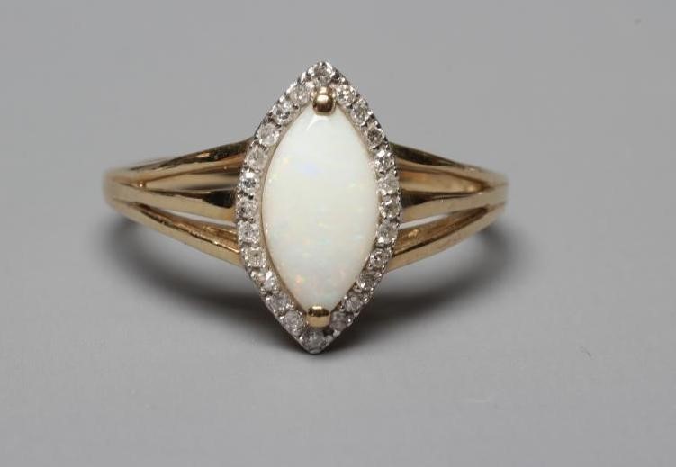 AN OPAL AND DIAMOND CLUSTER RING Image