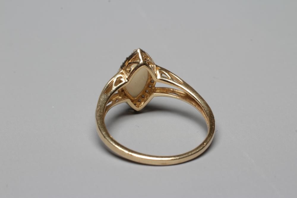 AN OPAL AND DIAMOND CLUSTER RING Image