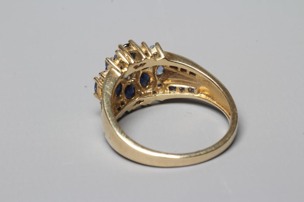 A TANZANITE AND SAPPHIRE CLUSTER RING Image