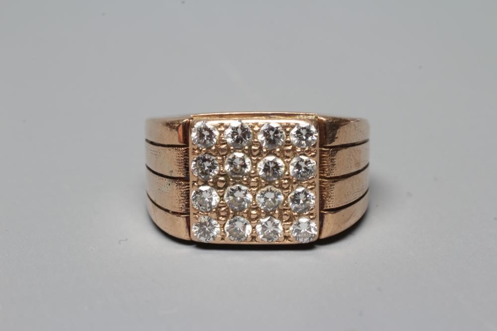 A GENTLEMAN'S DIAMOND SIGNET RING, the sixteen brilliant cut stones grain set to a square plaque Image