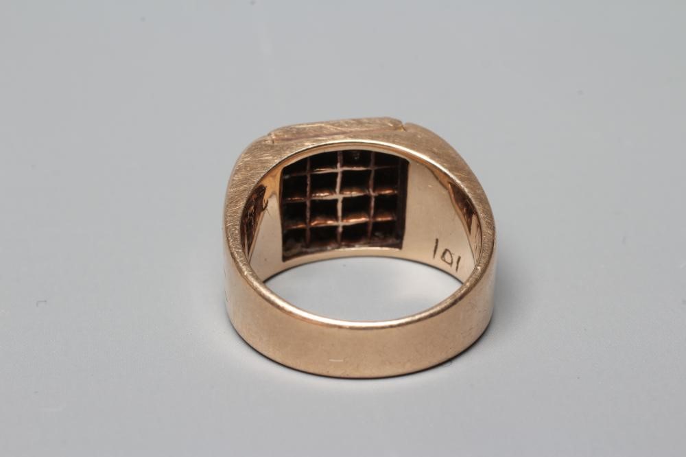 A GENTLEMAN'S DIAMOND SIGNET RING, the sixteen brilliant cut stones grain set to a square plaque Image