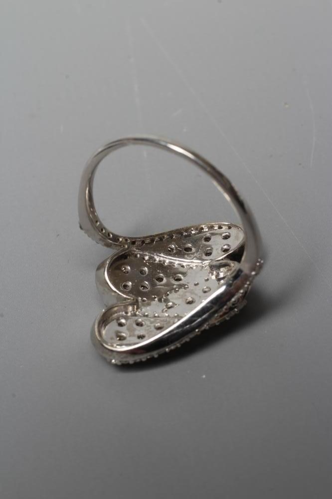 A DIAMOND COCKTAIL RING Image