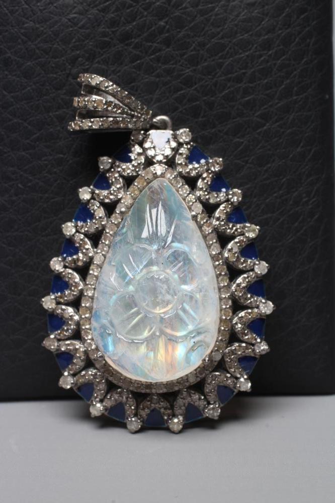 A MOONSTONE AND DIAMOND PENDANT Image