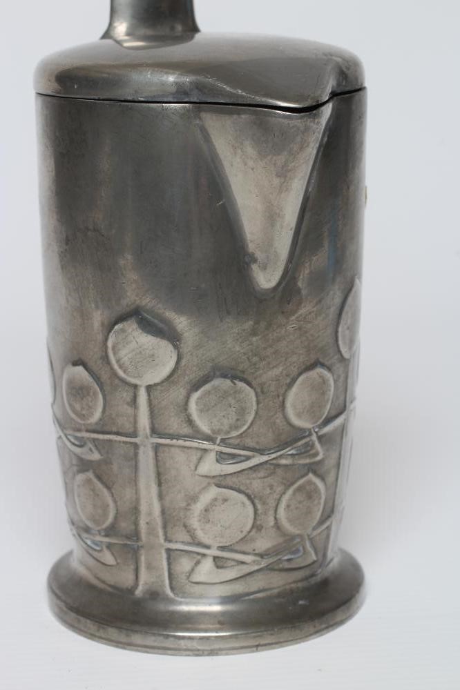 ARCHIBALD KNOX FOR LIBERTY - an English Pewter hot milk jug of cylindrical form Image