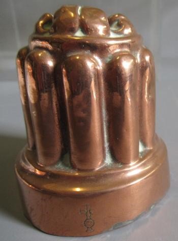 TWO SETS OF THREE SMALL VICTORIAN COPPER JELLY MOULDS of fluted tapering cylindrical form Image