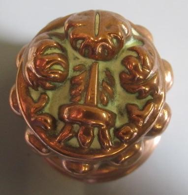 TWO SETS OF THREE SMALL VICTORIAN COPPER JELLY MOULDS of fluted tapering cylindrical form Image