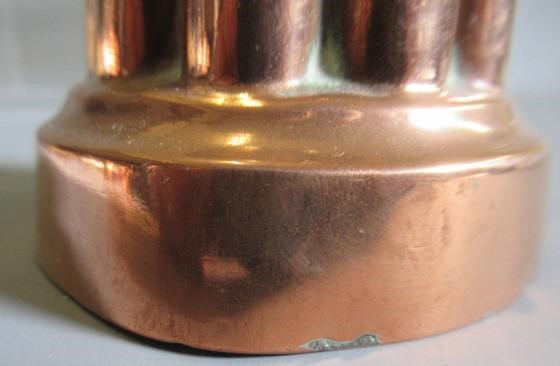 TWO SETS OF THREE SMALL VICTORIAN COPPER JELLY MOULDS of fluted tapering cylindrical form Image