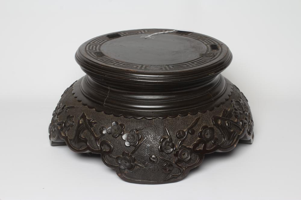 A CARVED CHINESE STAINED WOOD STAND Image