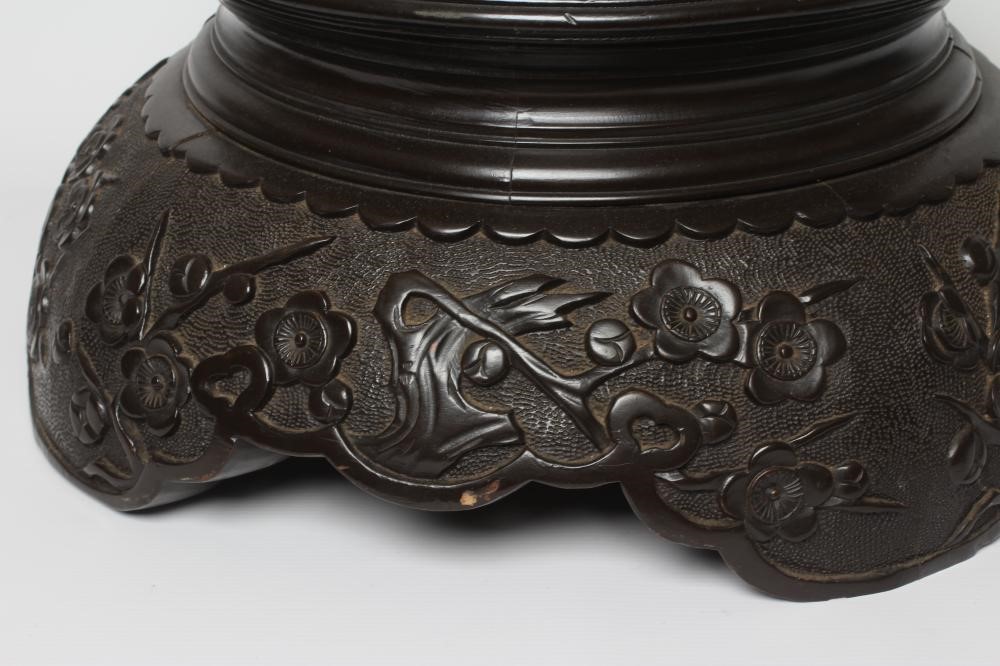 A CARVED CHINESE STAINED WOOD STAND Image