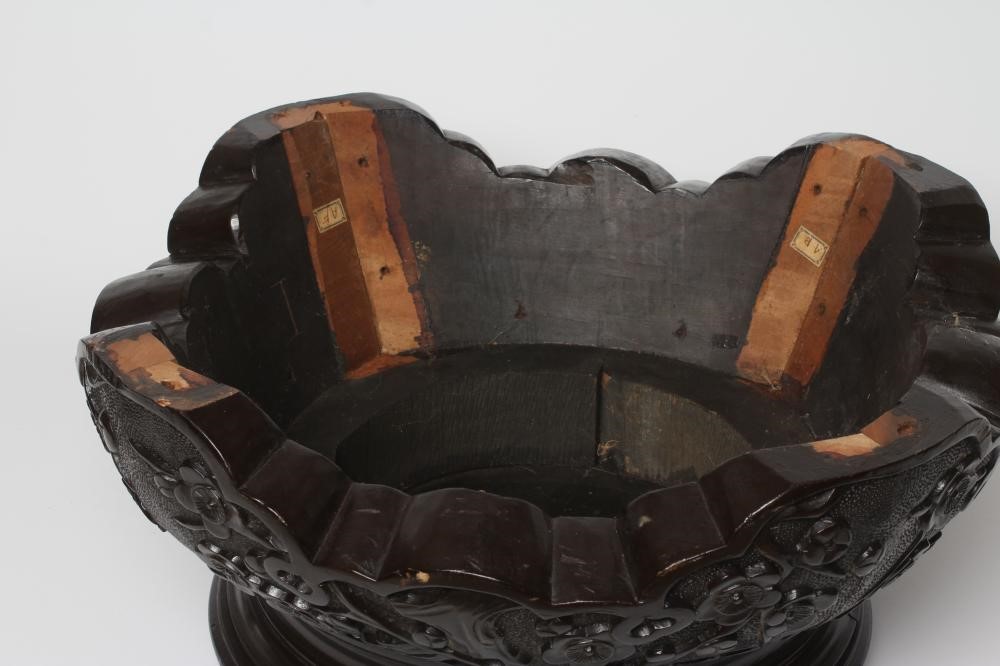 A CARVED CHINESE STAINED WOOD STAND Image