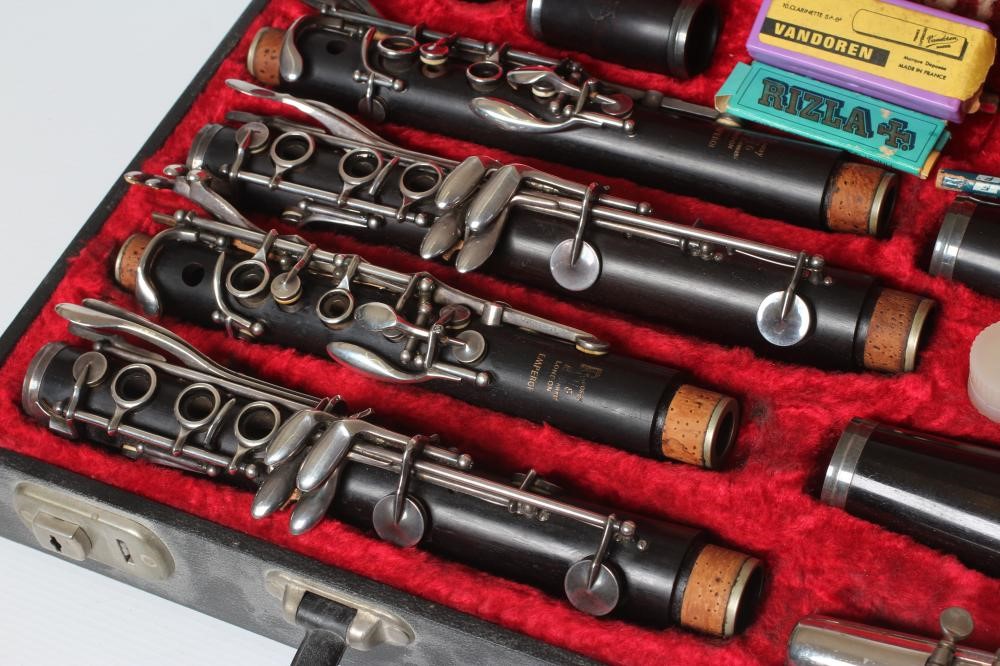 A PAIR OF BOOSEY & HAWKES EMPEROR B? CLARINETS, polished wood with bakelite (?) bells, serial Image