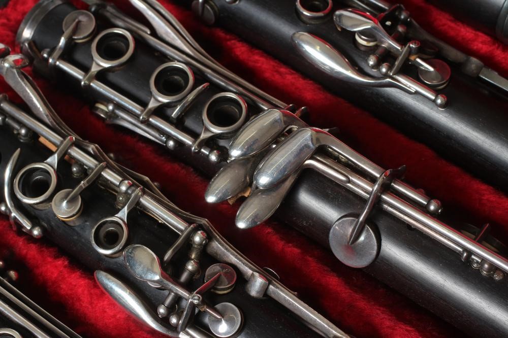 A PAIR OF BOOSEY & HAWKES EMPEROR B? CLARINETS, polished wood with bakelite (?) bells, serial Image