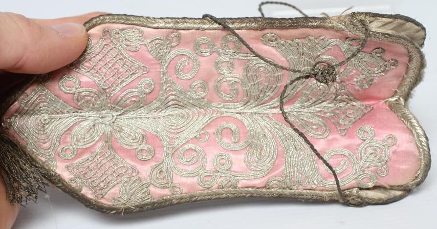 A PINK SILK DRAWSTRING PURSE Image