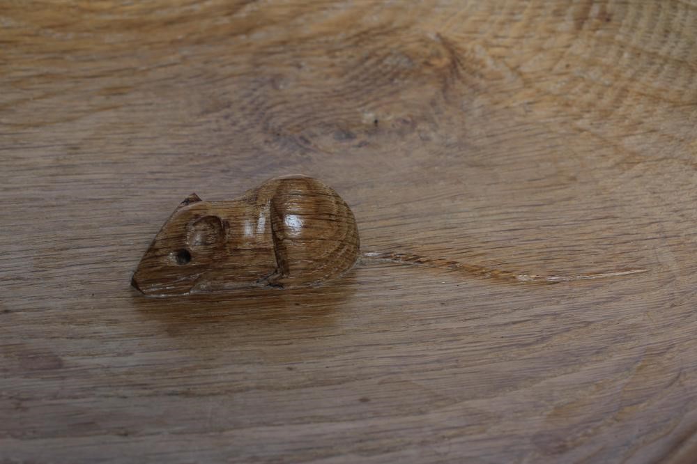A ROBERT THOMPSON OAK BOWL with carved mouse trademark to the centre, 3" high, 11" diameter (Est. Image