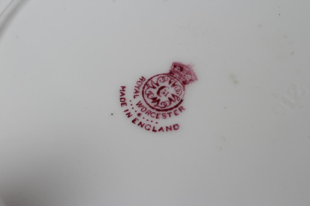 A ROYAL WORCESTER CHINA TEA CUP AND SAUCER Image