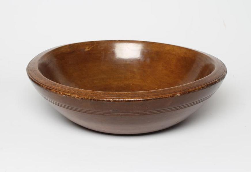A TREEN DAIRY BOWL, late 19th century, with incised banding to the exterior below the rim, 5" high, Image