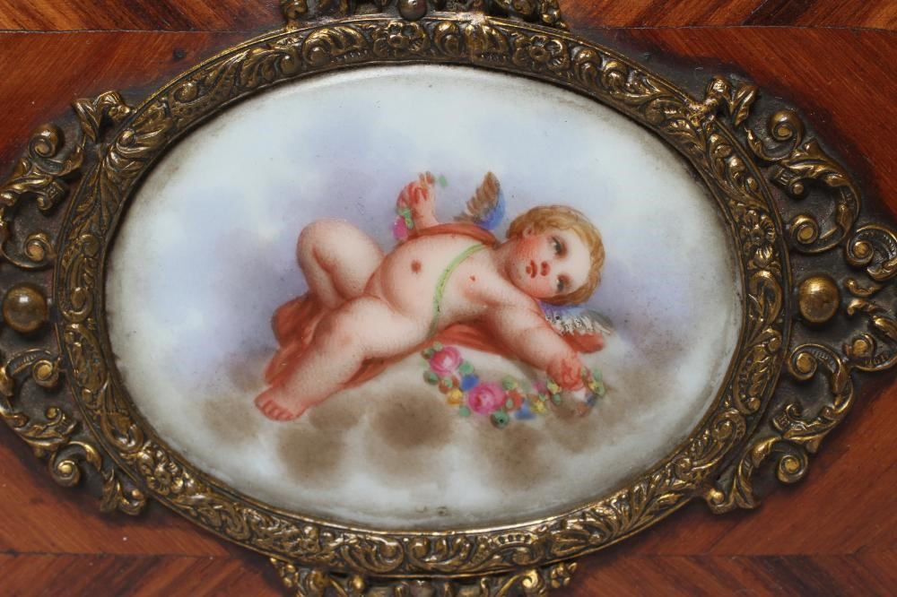 A LOUIS XV STYLE KINGWOOD OVAL TRINKET BOX, early 20th century, with metal mounts and inset Sevres Image