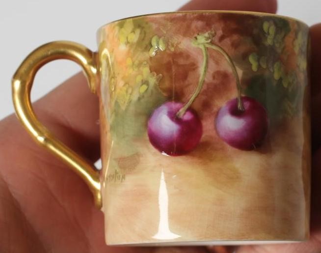 A ROYAL WORCESTER CHINA COFFEE CAN AND SAUCER Image