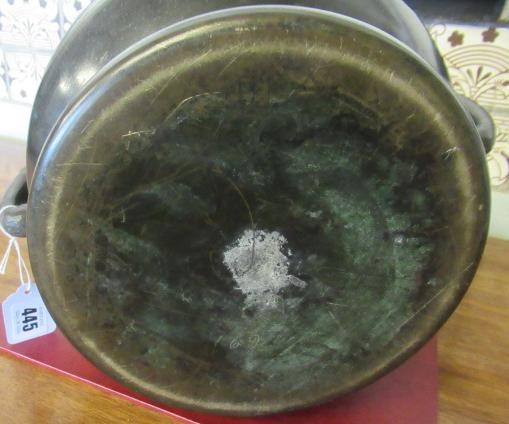 A CHINESE BRONZE JARDINIERE cast in relief with exotic birds set within two panels, flanked by two Image