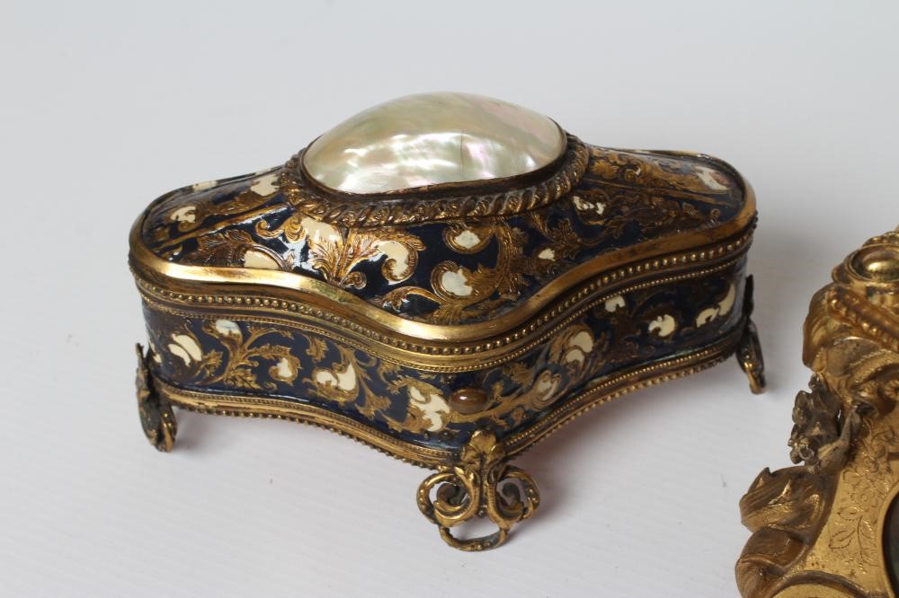 A GILT METAL ROCOCO REVIVAL JEWELLERY CASKET Image