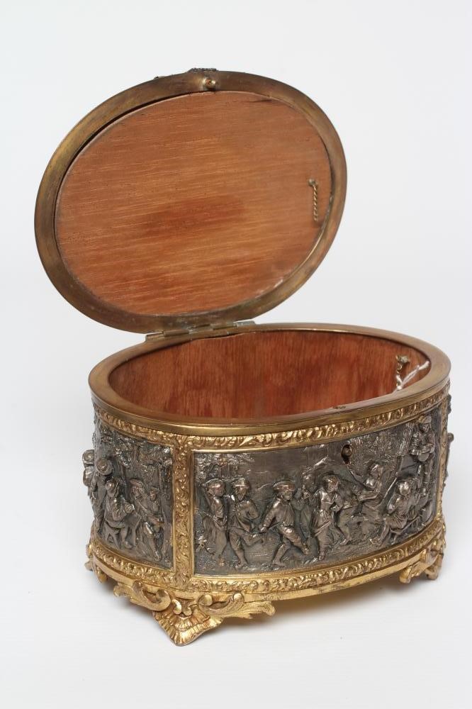 A FRENCH GILDED ORMOLU OVAL JEWELLERY CASKET Image