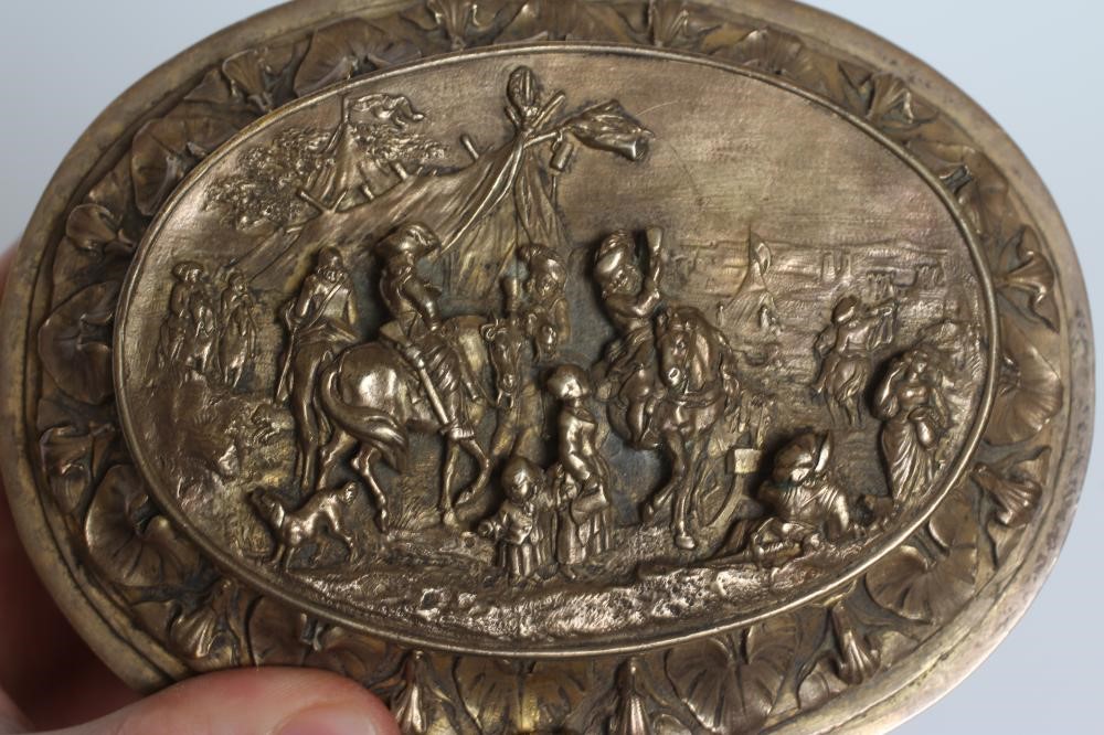 A FRENCH GILDED ORMOLU OVAL MUSICAL JEWELLERY CASKET Image