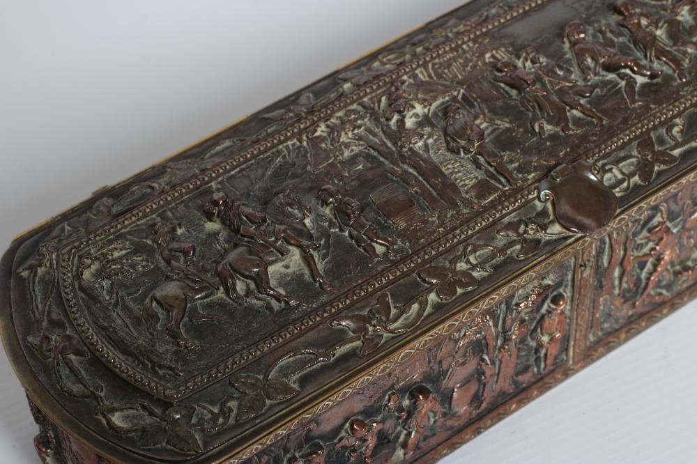 A FRENCH GILDED ORMOLU COPPER OVAL JEWELLERY CASKET Image