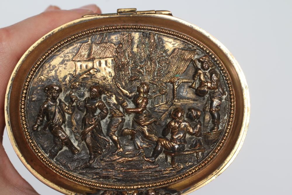 A FRENCH GILDED ORMOLU COPPER OVAL JEWELLERY CASKET Image
