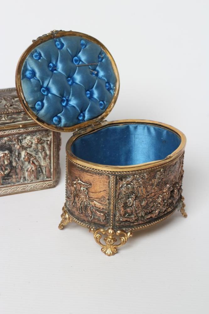 A FRENCH GILDED ORMOLU COPPER OVAL JEWELLERY CASKET Image