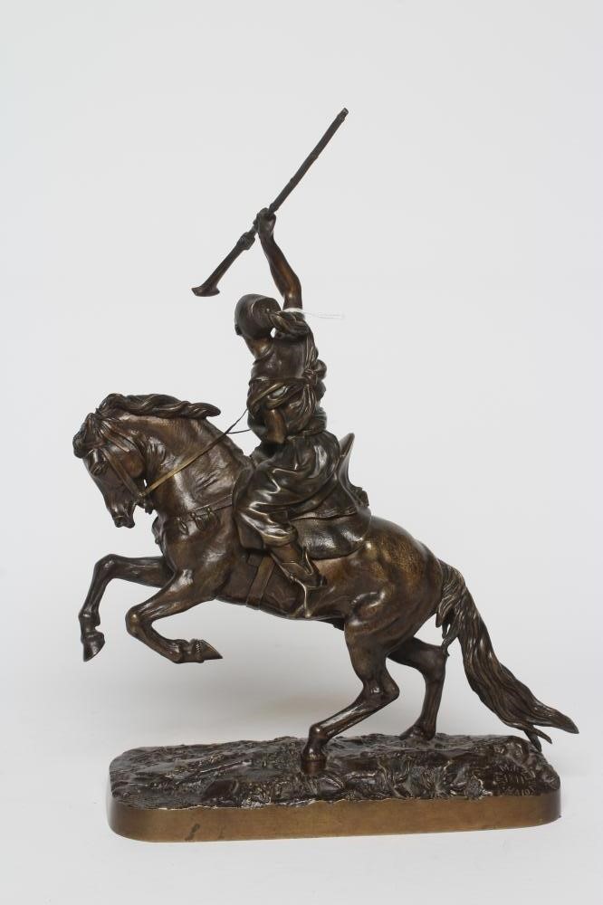 EUGENE LANCERAY (Russian 1848-1886) A horseman with rifle held aloft on a naturalistic base Image