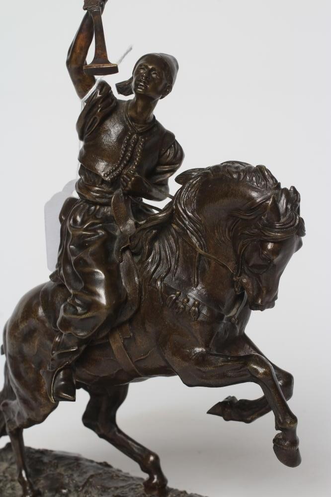 EUGENE LANCERAY (Russian 1848-1886) A horseman with rifle held aloft on a naturalistic base Image