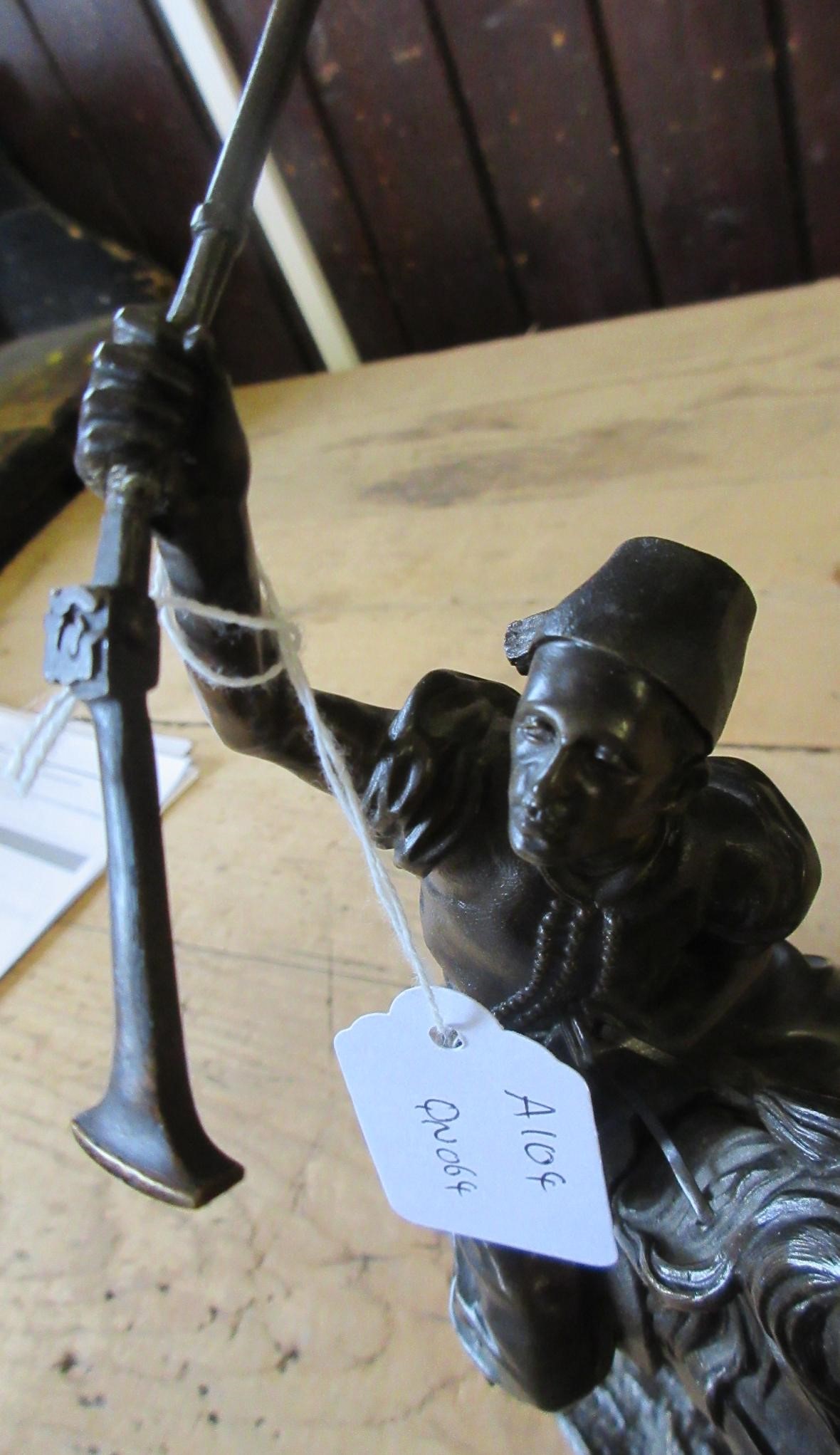 EUGENE LANCERAY (Russian 1848-1886) A horseman with rifle held aloft on a naturalistic base Image