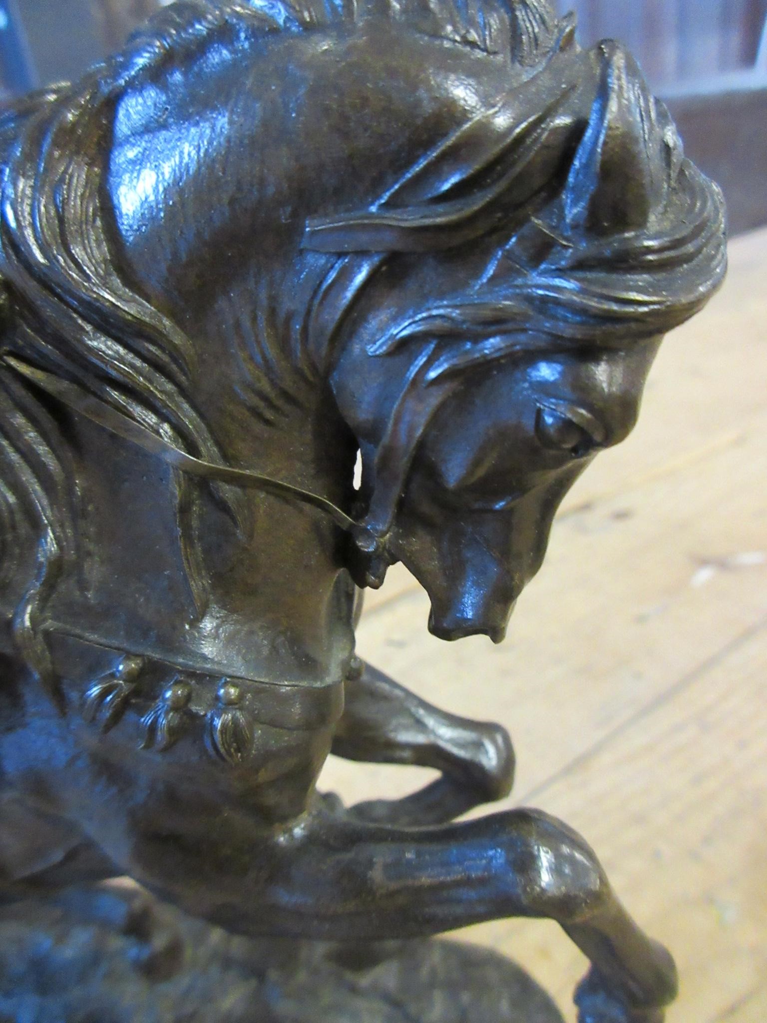 EUGENE LANCERAY (Russian 1848-1886) A horseman with rifle held aloft on a naturalistic base Image