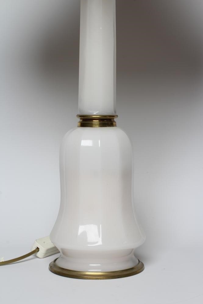 AN OPAQUE WHITE GLASS AND BRASS TABLE LAMP, mid 20th century, with faceted column and bulbous base, Image
