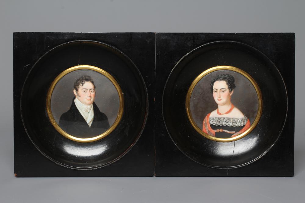 A PAIR OF CIRCULAR IVORY PORTRAIT MINIATURES Image
