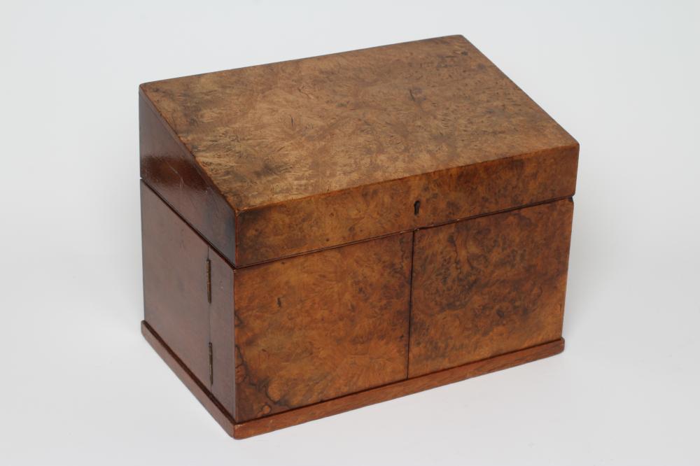 A VICTORIAN WALNUT DESK TOP TIDY the hinged top opening to reveal a paper organiser with leather pen Image