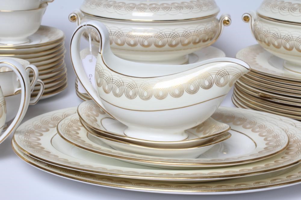 OF ROYAL INTEREST - a Wedgwood china Golden Persephone pattern dinner service designed by Eric Image