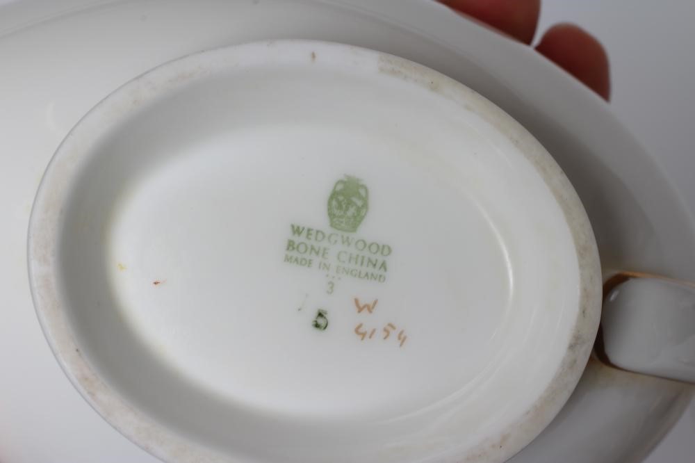 OF ROYAL INTEREST - a Wedgwood china Golden Persephone pattern dinner service designed by Eric Image