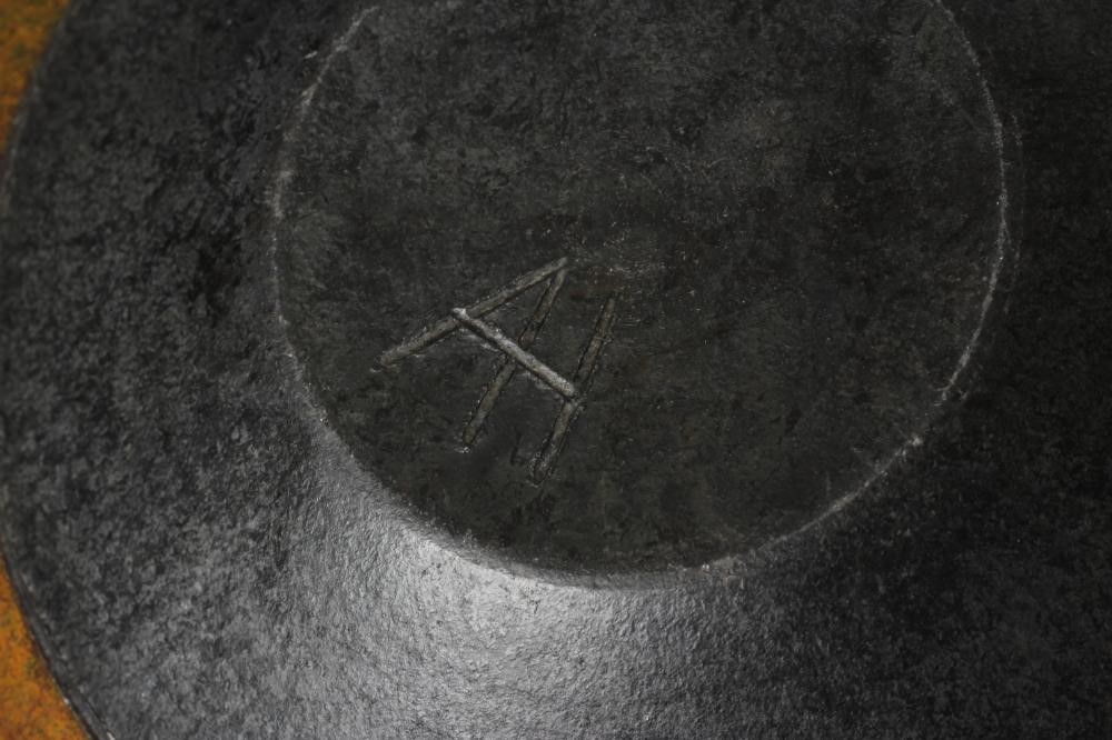 ANDREW HILL (b.1964) - a large raku stoneware conical bowl with mottled bronze Image