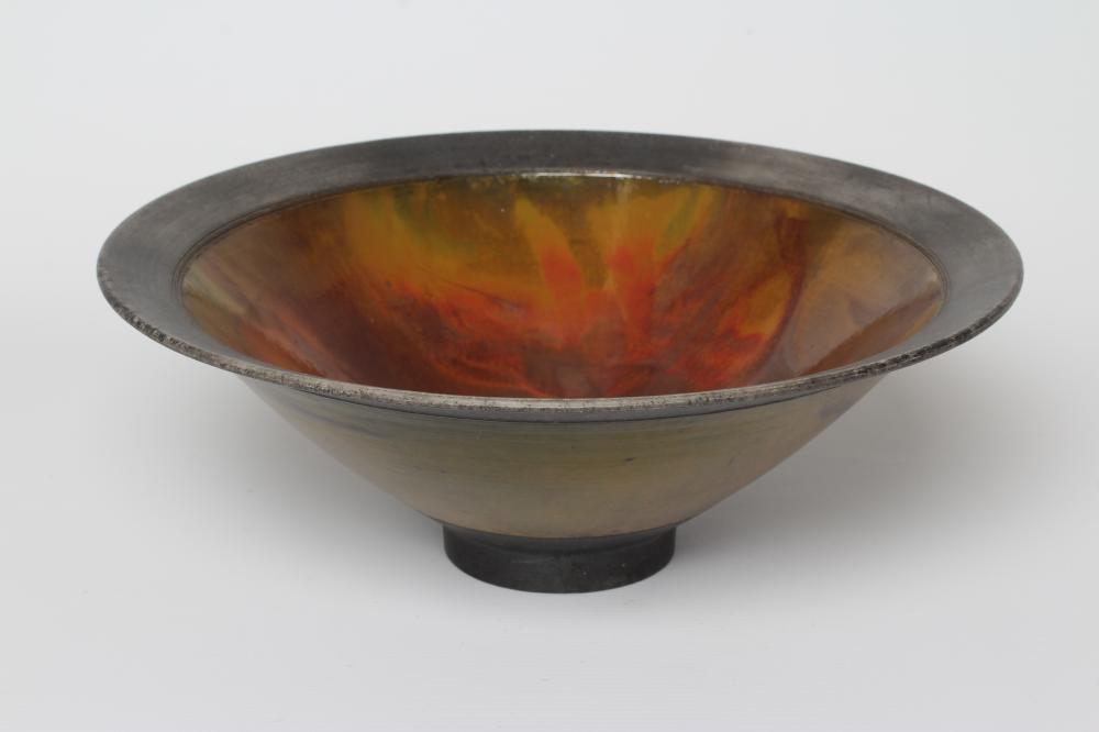 ANDREW HILL (b.1964) - a raku stoneware pedestal conical bowl with mottled red and copper glaze Image